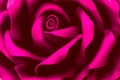 A beautiful flower of pink plastic. Abstract blurred background. Selective focus