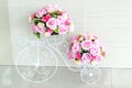 Beautiful flowerpot made of steel wire shaped bicycle.