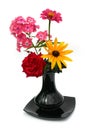 Beautiful flowers in a black vase