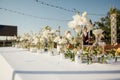 Beautiful flowers decorated on the table. Tables set for an event party or wedding reception. Royalty Free Stock Photo