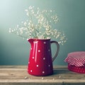 Beautiful flowers in red jug Royalty Free Stock Photo