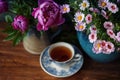 Flowers and Cup of tea at summertime