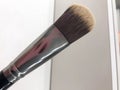 Beautiful fluffy brush for applying makeup, powder, eye shadow Royalty Free Stock Photo