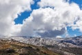 Beautiful fluffy clouds over Snowy Mountains at Mount Kosciuszko National Park, Australia Royalty Free Stock Photo