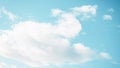 Fluffy white cloud on the blue aquamarine color sky background. 16:9 Royalty Free Stock Photo