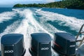 A beautiful foamy trail from a boat with three powerful engines, leaving from Banana Beach of Coral Koh He Island, Thai