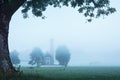 Beautiful foggy landscape with Saint Coloman Church in Bavaria, Germany