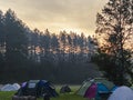 Foggy morning at camp with tents