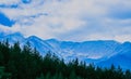 Beautiful foggy mystic alpine mountains landscape. Fog clouds at Royalty Free Stock Photo