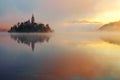 Beautiful foggy sunrise the Bled lake on autumn Royalty Free Stock Photo