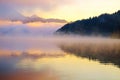 Beautiful foggy sunrise the Bled lake on autumn Royalty Free Stock Photo