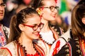 Beautiful folklore dancer girl is smiling at the celebration