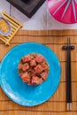Beautiful food: fresh tuna tartar top view on a plate