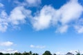 Beautiful form of white fluffy clouds on vivid blue sky in a suny day Royalty Free Stock Photo