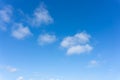 Beautiful form of white fluffy clouds on vivid blue sky in a suny day Royalty Free Stock Photo