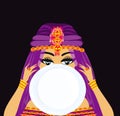 Beautiful Fortuneteller woman reads the future from a magic ball