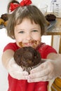 Beautiful Four Year Old Girl with Chocolate Chip Muffin Royalty Free Stock Photo