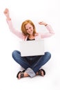 Beautiful freckled teen with computer Royalty Free Stock Photo