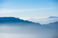 Beautiful french alps winter panoramic aerial view landscape with a fantastic blue haze cloudy mountain background Royalty Free Stock Photo