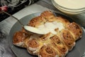 Beautiful fresh cinnamon rolls. The cooking process. Fresh fragrant pastries. Raw dough for buns.The process of making buns Royalty Free Stock Photo