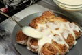 Beautiful fresh cinnamon rolls. The cooking process. Fresh fragrant pastries. Raw dough for buns.The process of making buns Royalty Free Stock Photo