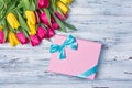 Beautiful fresh yellow and pink tulips bouquet with gift box Royalty Free Stock Photo