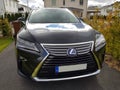 Beautiful front view of Lexus RX black car model.