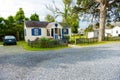 Beautiful front yard of typical American single family homes on Assateague Island. Mowed green lawn