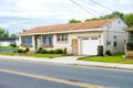 Beautiful front yard of typical American single family homes on Assateague Island. Mowed green lawn