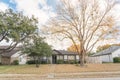 Beautiful front yard of typical single family houses near Dallas in fall season colorful leaves Royalty Free Stock Photo