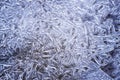 Beautiful frost ice crystals on frozen puddle water, blue color, background, closeup Royalty Free Stock Photo