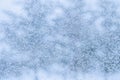 Beautiful frosty pattern on the window. Blue winter background. Frost drawing Royalty Free Stock Photo