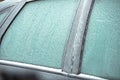 Beautiful frosty patterns on the glass of the car Royalty Free Stock Photo