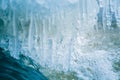 A beautiful frozen icicles at the bank of river in Latvia. Royalty Free Stock Photo