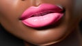 Beautiful full lips with glossy make-up, pink glitter lipstick black girl. Close-up of sexy natural lips giving kiss