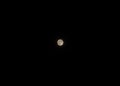 Full moon in dark sky