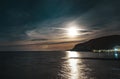 Beautiful full moon over the mountain and the sea Royalty Free Stock Photo