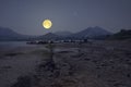Full moon over mountains and river Royalty Free Stock Photo