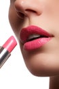 Beautiful full pink lips. Lipstick. Professional make-up