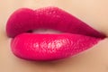 Beautiful full pink lips. Pink lipstick. Make-up and cosmetics Royalty Free Stock Photo