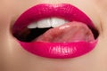 Beautiful full pink lips. Pink lipstick. Make-up and cosmetics Royalty Free Stock Photo