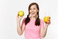 Beautiful fun happy woman holding in hands green apple and orange fresh juice in glass isolated on white background Royalty Free Stock Photo