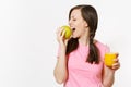 Beautiful fun happy woman holding in hands green apple and orange fresh juice in glass isolated on white background Royalty Free Stock Photo