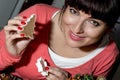 Beautiful funny woman cutting gingerbread shapes from dough