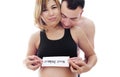 Beautiful future parents: his pregnant asian wife and a happy husband welcome baby coming soon Royalty Free Stock Photo