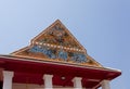 ?Beautiful gable of the church is decorated with stucco and ceramic designs in the temple ?Bangkok Royalty Free Stock Photo