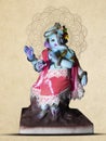 Beautiful Ganesha statue in the pose of Lord Krishna. Handcrafted, cute Ganesh murti on background