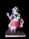 Beautiful Ganesha statue in the pose of Lord Krishna. Handcrafted, cute Ganesh murti on isolated background