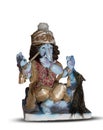 Beautiful Ganesha statue in the pose of Lord Krishna. Handcrafted, cute Ganesh murti on isolated background