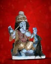 Beautiful Ganesha statue in the pose of Lord Krishna. Handcrafted, cute Ganesh murti on isolated background